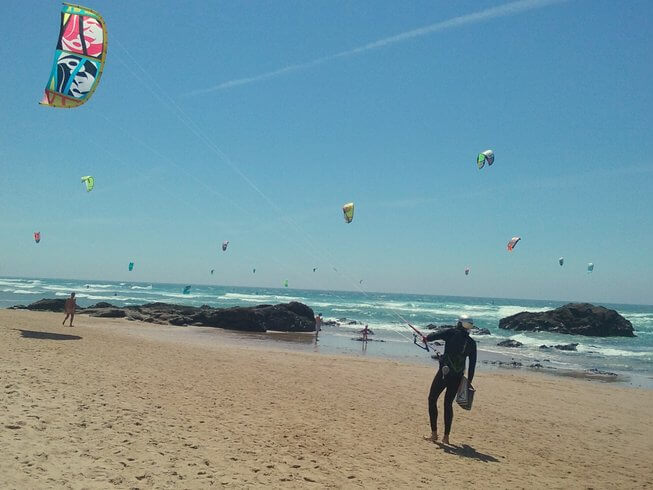 Kitesurf, Surf, Yoga, and SUP surrounded by nature in Cascais, Lisbon