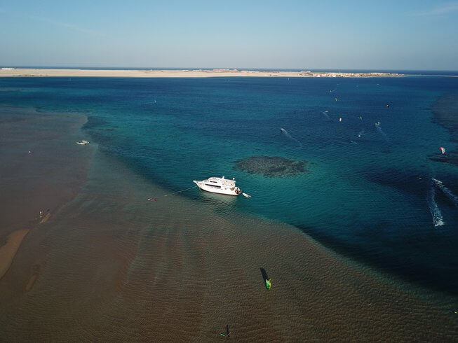 “Kite-Eat-Sleep-Repeat” in a Boat at Soma Bay