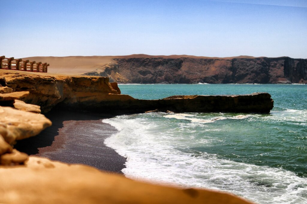 Kitesurfing in Paracas, Peru, desert coastline